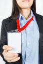 Woman holding Identification card. Royalty Free Stock Photo