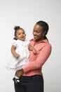 Woman holding infant girl. Royalty Free Stock Photo