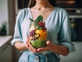 A woman holding a jar filled with fruit and vegetables. AI generative image. Royalty Free Stock Photo