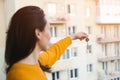 Woman holding keys to a new apartment. Real estate industry Royalty Free Stock Photo