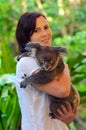 Woman holding a Koala Royalty Free Stock Photo