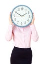 Woman holding a large clock face.