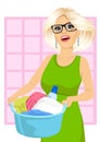 Woman holding a laundry basket full of dirty clothes Royalty Free Stock Photo