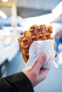 Woman holding Liege waffle sugar