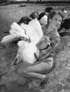 Woman holding live turkey