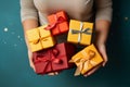 Woman holding lots of colourful holiday gift boxes, top view Royalty Free Stock Photo