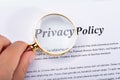 Woman Holding Magnifying Glass Over Privacy Policy Form Royalty Free Stock Photo