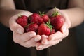 Woman holding many tasty fresh strawberries Royalty Free Stock Photo