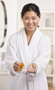 Woman Holding Medication Royalty Free Stock Photo