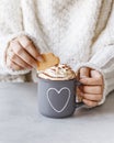 Woman holding metal mug of hot chocolate in hands Royalty Free Stock Photo