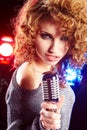 Woman holding microphone Royalty Free Stock Photo