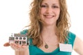 Woman holding miniature house Royalty Free Stock Photo