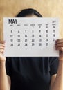 Woman holding Monthly calendar of May, 2019 Royalty Free Stock Photo