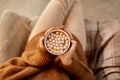 woman holding mug of hot chocolate and marshmallow Royalty Free Stock Photo