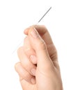 Woman holding needle for acupuncture on white background, closeup Royalty Free Stock Photo