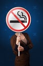 Woman holding no smoking sign Royalty Free Stock Photo