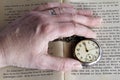 A woman is holding an old pocket watch Royalty Free Stock Photo