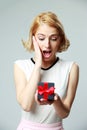 Woman holding an open jewelery gift box Royalty Free Stock Photo