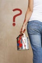 Woman Holding Paint Can With Painted Question Mark On Wall Royalty Free Stock Photo