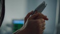 Woman holding patient hand in ward closeup. Hospital heartbeat computer screen.