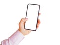 Person holding phone with empty white touchscreen. Mobile app mockup.