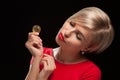 Woman holding physical bitcoin cryptocurrency coins in her hands