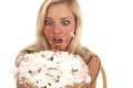 Woman holding pie by face messy