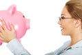 Woman holding piggy bank. Royalty Free Stock Photo