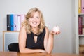 Woman is holding piggy bank Financial budget saving concept on the office desk