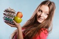 Woman holding pills and fruits. Health care Royalty Free Stock Photo