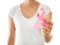 Woman holding pink ribbon on white background, closeup. Breast cancer awareness concept Royalty Free Stock Photo
