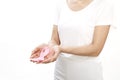 Woman holding a pink ribbon. Royalty Free Stock Photo