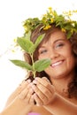 Woman holding plant Royalty Free Stock Photo