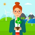 Woman holding plant. Royalty Free Stock Photo