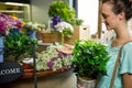 Woman holding pot plant Royalty Free Stock Photo