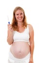 Woman is holding pregnancy test Royalty Free Stock Photo