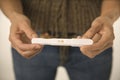 Woman holding pregnancy test. Royalty Free Stock Photo