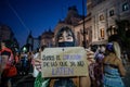 Woman holding a protest poster on International march for women's day