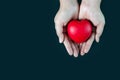 Woman holding red heart on hand, Blood donation concept Royalty Free Stock Photo