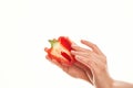 woman holding red pepper in her hands cooking vegetables kitchen ingredient Royalty Free Stock Photo