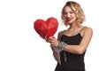 Woman holding red polygonal paper heart shape with tied by chain hands