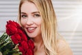 Woman holding red roses close up Royalty Free Stock Photo