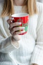 Woman holding red tea cup Royalty Free Stock Photo