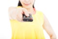 Woman holding remote control for tv Royalty Free Stock Photo