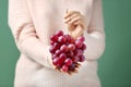 Woman holding ripe juicy grapes, closeup Royalty Free Stock Photo