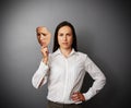 Woman holding sad mask Royalty Free Stock Photo