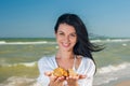 Woman holding seashells Royalty Free Stock Photo