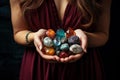 Woman holding semiprecious stones in hands dress. Generate Ai Royalty Free Stock Photo