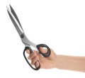 Woman holding sharp sewing scissors on white background Royalty Free Stock Photo