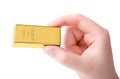 Woman holding shiny gold bar on white background, closeup Royalty Free Stock Photo